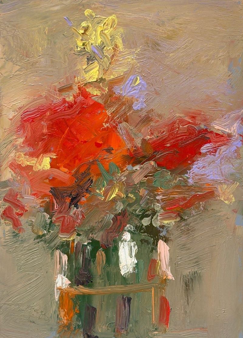 Red and orange flowers in a jar
